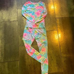 Three sets of Lilly Pulitzer pajamas. All the same style. All used condition
